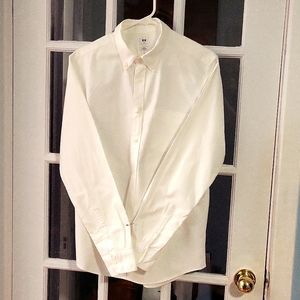 Uniqlo women's white  long sleeve polo shirt, US Medium size.